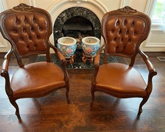 Italian Leather tufted wing back chairs 