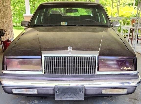 226 - 1990 Chrysler New Yorker Landau 4-Door Sedan Mileage shows 110,142 - but not accurate, odometer does not work Leather top, cloth seats - clean Runs but the gas tank has a leak Title available