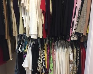 Closets full of ladies clothing.