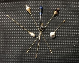 Hat pins.