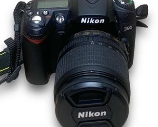 Nikon 12.3 MP DSLR Camera Model: D90 w/ A Nikon AF-S DX Nikkor 18-105mm f/3.5-5.6G ED Vibration Reduction Zoom Lens
