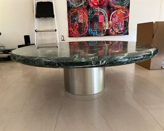 Green marble cocktail table with drum base 48" x 16"