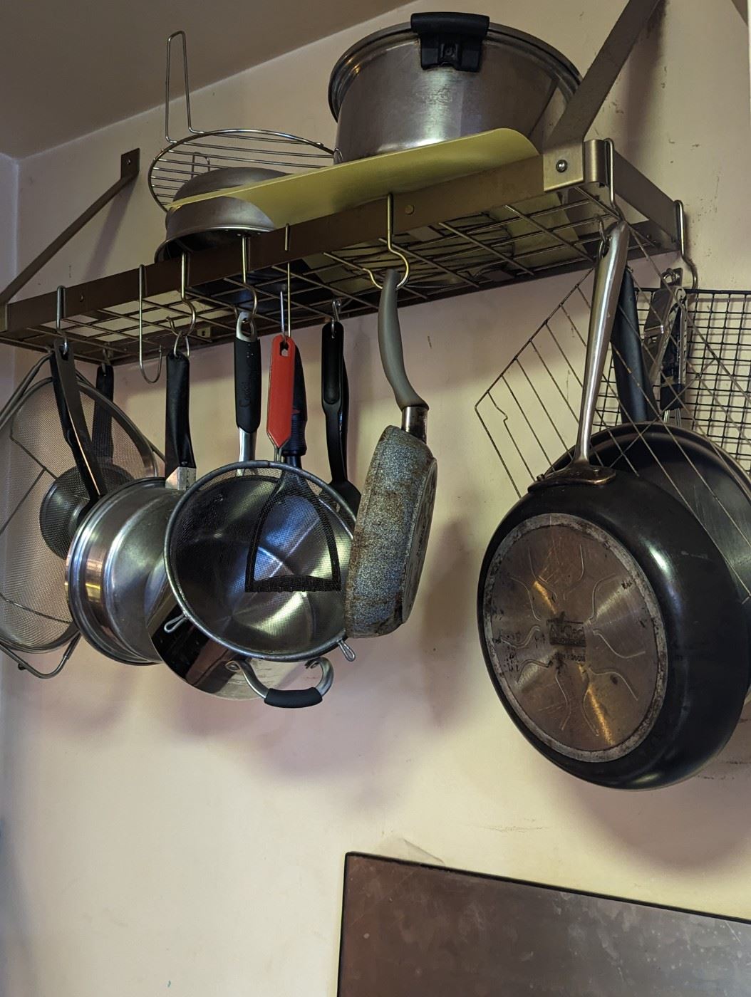 Pots and pans, rack not for sale