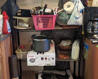 Miscellaneous household items, done still unopened. Rack not for sale