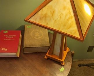 Lamp, table, two books "World who's who in science" "The Columbia encyclopedia"