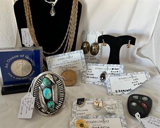 Native American turquoise cuff, GTE silver coin, Wilshire police pins