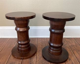 Solid wood spool type small tables. These could additionally have pieces of glass on top to make them larger.