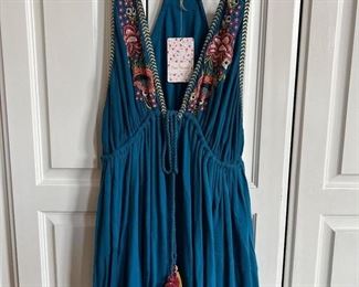This cute dress is new with tags attached from Free People