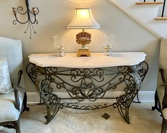 Marble top wrought iron console table
62” w, 19.5” d, 33.5” h
