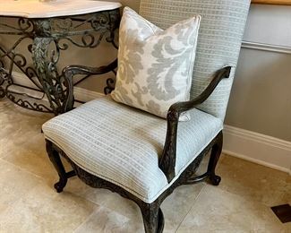 Custom upholstered and ebonized Louis XV armchairs
