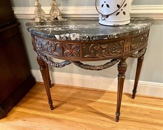 Early 20th century marble top demilune table
42” w, 21” d, 33” h
