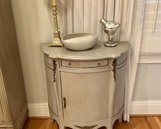 Painted demilune cabinet
31” w, 15” d, 34” h
