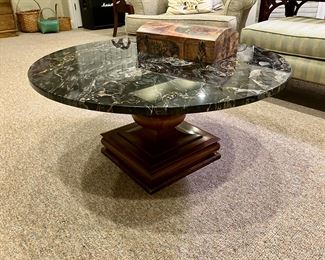 Black marble top coffee table
38” w, 17” h
