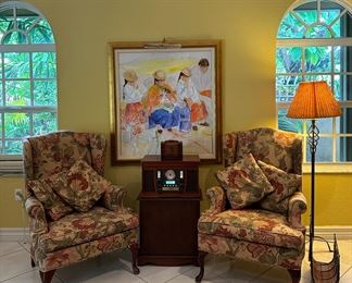 The record player/radio and magaine rack are sold.