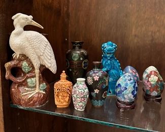 The snuff bottles and cloisonne vases are sold.
