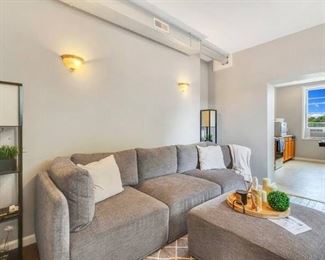 Value City Furniture Rio collection grey 144" sectional with chaise