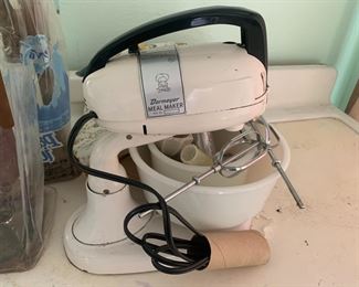 Stand mixer with attachments