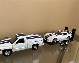 # 28 Maisto Diecast Cars
Dodge Ram SS pickup towing Viper and trailer
$35