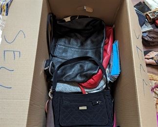 Lots of purses and handbags