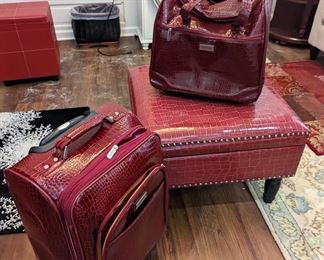 Leather luggage and ottoman