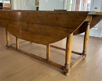 Antique Drop Leaf Farm Table. Measures 72" L x 60" W x 29" H. Width When Sides Are Dropped: 28" W. Photo 5 of 7.