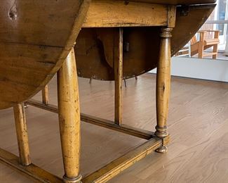 Antique Drop Leaf Farm Table. Measures 72" L x 60" W x 29" H. Width When Sides Are Dropped: 28" W. Photo 6 of 7.