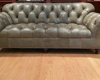 Hancock & Moore Tufted Moss-Colored Leather Upholstered Sofa with Nailhead Trim. Measures 87" W x 39" D with 22" Seat Height. Back Measures 35" H. Photo 1 of 6.