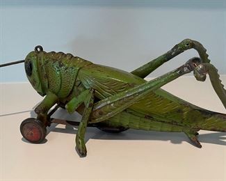 1920s Hubley Cast Iron Grasshopper Pull Toy. Needs Repair of Leg. Photo 2 of 2.