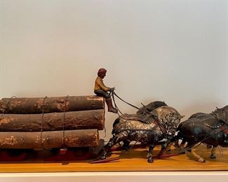 Vintage Logger Sculpture. Measures 45" W x 11.5" D x 15.5" H. Photo 1 of 2.