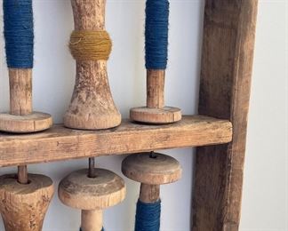 Folk Art. Antique Sewing Spool Wall Sculpture. Measures 44" W x 20" H. Photo 3 of 3.