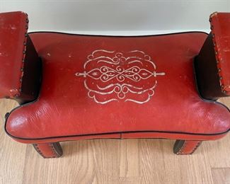 Vintage Camel Saddle Ottoman. Measures 24" W x 13" D x 18" H. Photo 3 of 3.