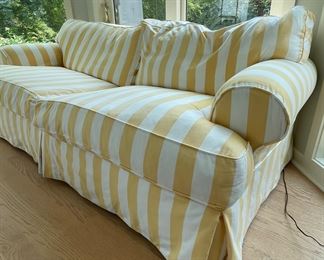Yellow & White Stripe Sunbrella Fabric Upholstered Two-Seat Sofa. Measures 90" W x 42" D with 20.5" Seat Height. Photo 2 of 2.