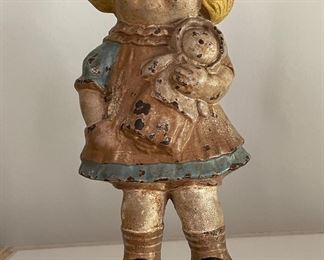 Antique Cast Iron Girl With Doll Doorstop. Photo 1 of 3.