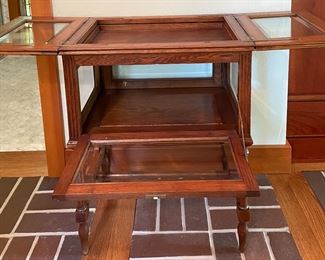 Vintage Curio / Liquor Cabinet With Flip-Top Rising Shelf. Measures 24" W x 15.5" D x 31.5" H. Photo 5 of 6.