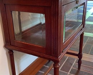 Vintage Curio / Liquor Cabinet With Flip-Top Rising Shelf. Measures 24" W x 15.5" D x 31.5" H. Photo 1 of 6.