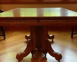 Oak Pedestal Dining Table. Measures 44" W x 60" L x 30" H. Photo 1 of 6.