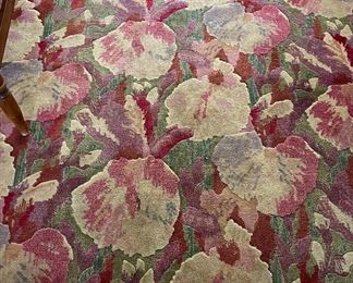 Hand-Woven Floral Rug Signed By Artist. Measures 5' x 7'.