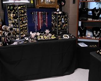 Lots of costume jewelry. We have estate jewelry in the showcase (available during the hours of the sale)
