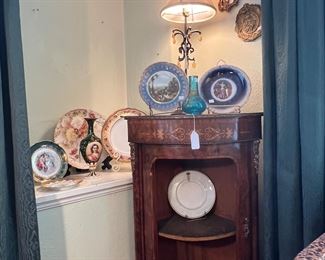 Magnificent antique French corner cabinet with fruit, wood, inlay, and ormolu mounts