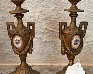 Beautiful pair of antique candle sticks with inset porcelain plaques
