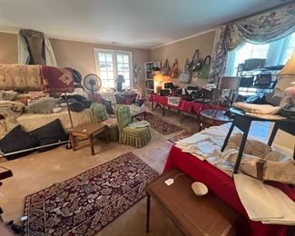 Master bedroom full of fine things and clothing