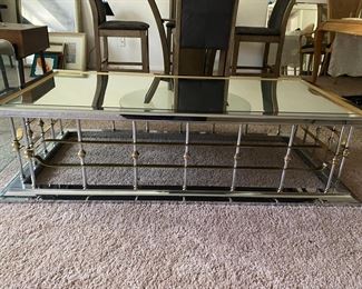 Living room table from Gormans, glass, chrome with brass assets