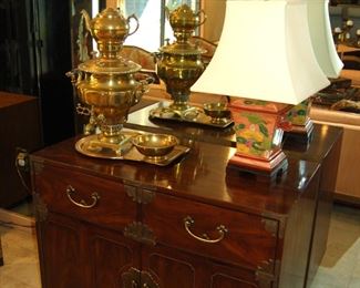 Brass coffee urn on chest