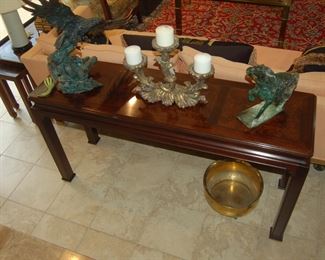 Coffee table with brass triple candlestick