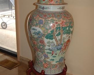 Large Chinese jar on wooden stand