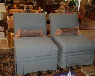 Two of four armless chairs