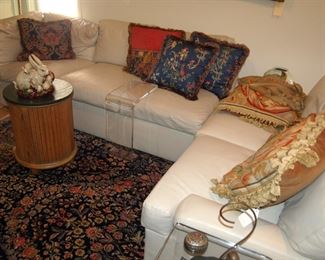 Leather sofa with acrylic tables