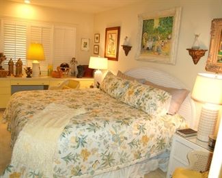 King bed with wicker headboard