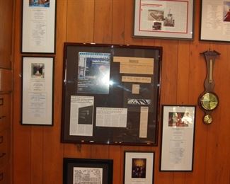 Framed newspaper clippings