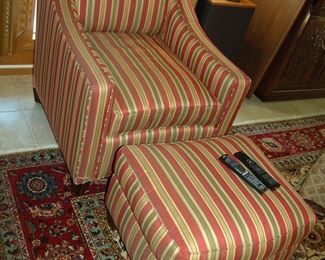 Silk upholstered chair and matching ottoman